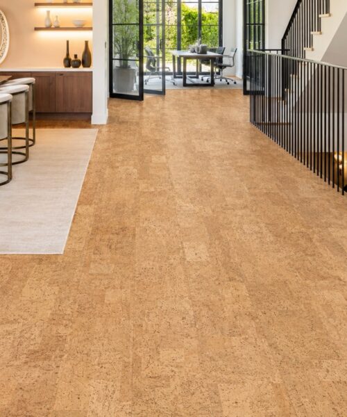 Leather Natural 12Mm Cork Floating Flooring In An Open Concept Dining Room With Staircase And Floor-To-Ceiling Windows.