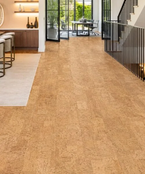 Leather - 1/4&Quot; (6Mm) - Cork Glue Down Tile (Gle6) Leather Natural 12Mm Cork Floating Flooring In An Open Concept Dining Room With Staircase And Floor-To-Ceiling Windows.