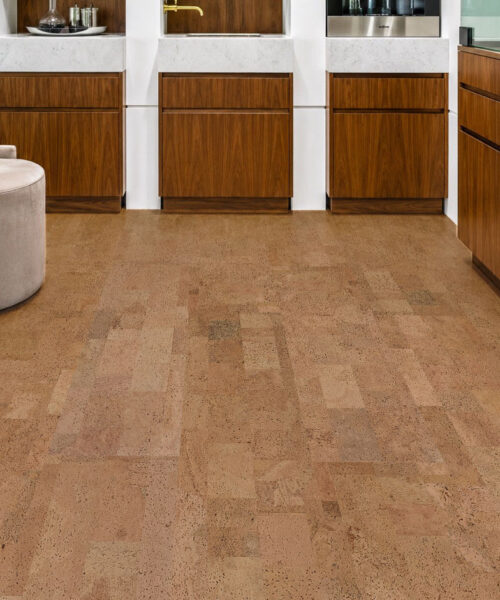 Leather Natural 12Mm Cork Floating Flooring In A Luxury Walnut Kitchen With Marble Countertops And Custom Cabinetry.