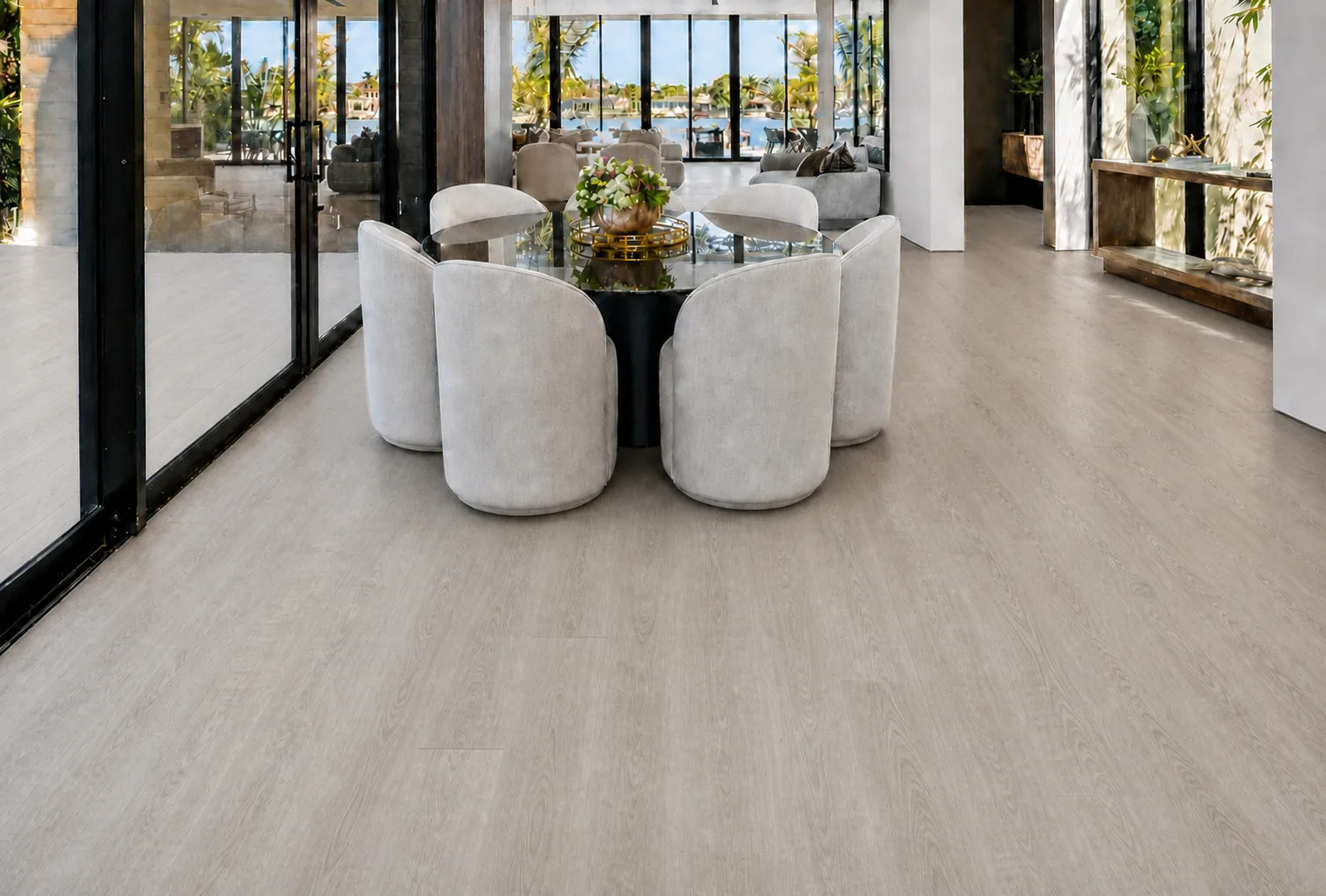 Light Grey Oak - 13/32&Quot; (10.5Mm) - Design Cork Floating (Flg10.5) Light Grey Oak Plank Flooring In A Waterfront Dining Room With Glass Doors And White Chairs