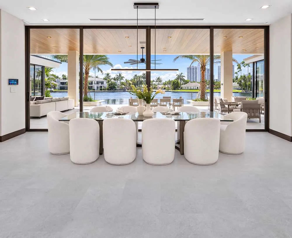 Light Slate - 7/16&Quot; (11Mm) - Swiss Design Cork Floating (Flgs11) Light Slate Swiss Design Cork Flooring Installed In A Modern Waterfront Dining Room With Floor-To-Ceiling Windows