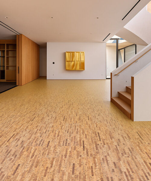 Linea Dark 11Mm Swiss Real Cork Floating Flooring Installed In A Modern Open-Concept Living Room With Staircase And Natural Wood Accents.