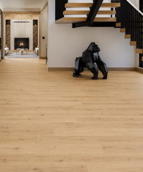 Long Beach - 7/16&Quot; (11Mm) - Swiss Design Floating (Flb11) Modern Entryway Featuring Long Beach 11Mm Swiss Design Cork Floating Flooring In A Light Natural Oak Finish With An Open Staircase And Contemporary Architecture.