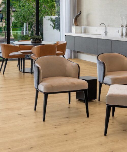 Long Beach - 7/16&Quot; (11Mm) - Swiss Design Floating (Flb11) Modern Lounge And Dining Area Showcasing Long Beach Swiss Design Cork Flooring With Light Oak Planks, Large Windows, And Luxury Seating.