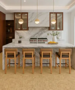 Luxury Kitchen With Marble Island And Swiss Parcork Flooring, Combining Modern Design With Warm Natural Texture.