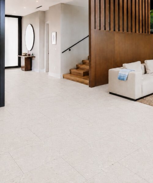 Matera Blend - 19/64&Quot; (7.5Mm) - Swiss Techslate (Mmatbd7.5) Matera Blend Contemporary Architectural Flooring In Light Limestone Spans An Entryway And Living Room With A Wine Display And Wood Wall.