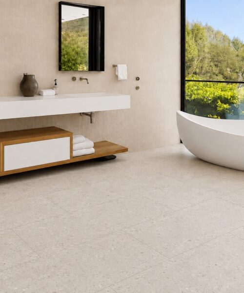 Matera Blend - 19/64&Quot; (7.5Mm) - Swiss Techslate (Mmatbd7.5) Matera Blend Waterproof Floating Flooring In Light Limestone Shows Mineral Texture And Micro-Beveled Planks Beside A Freestanding Bathtub.