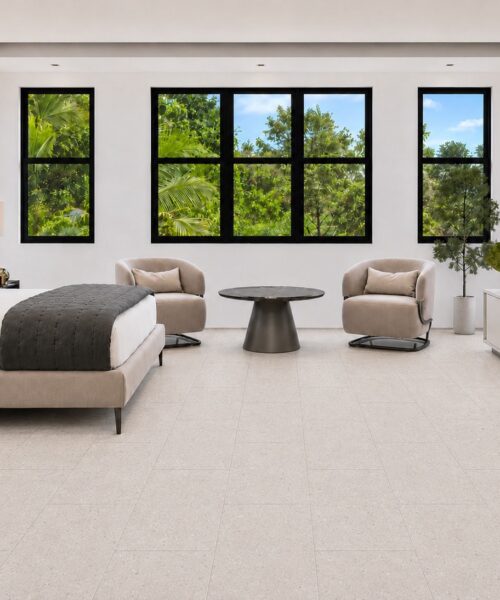 Matera Blend - 19/64&Quot; (7.5Mm) - Swiss Techslate (Mmatbd7.5) Light Limestone Matera Blend Swiss Techslate Flooring Creates A Bright Bedroom Setting With Rectangular Planks, Upholstered Bed, And Dark Accents.