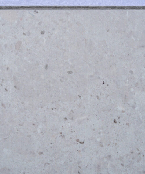 Matera Blend Swiss Techslate flooring featuring a light limestone appearance with subtle natural stone texture, modern stone-look flooring for kitchens, bathrooms, and contemporary living spaces.