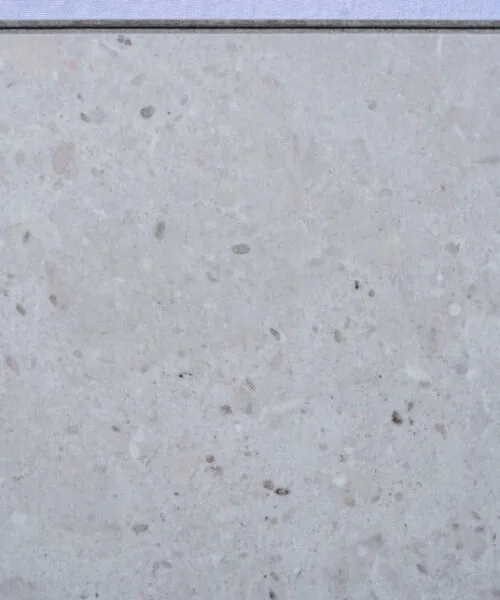 Matera Blend Swiss Techslate flooring featuring a light limestone appearance with subtle natural stone texture, modern stone-look flooring for kitchens, bathrooms, and contemporary living spaces.