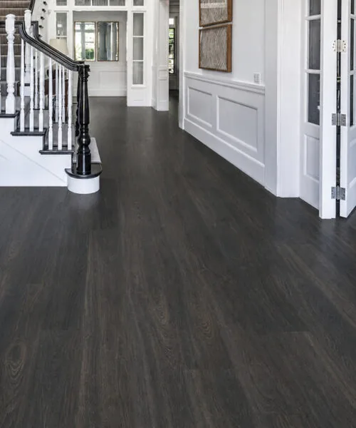 Mocha - 7/16&Quot; (11Mm) - Swiss Design Cork Floating (Fmoc11) Mocha Dark Brown Swiss Design Cork Floating Flooring In A Modern Entryway With A Black Staircase
