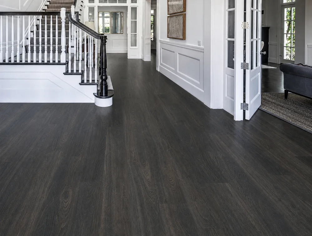 Mocha - 7/16&Quot; (11Mm) - Swiss Design Cork Floating (Fmoc11) Mocha Dark Brown Swiss Design Cork Floating Flooring In A Modern Entryway With A Black Staircase