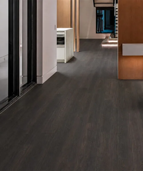 Mocha - 7/16&Quot; (11Mm) - Swiss Design Cork Floating (Fmoc11) Mocha 11Mm Dark Wood-Look Cork Flooring Installed In A Contemporary Hallway.