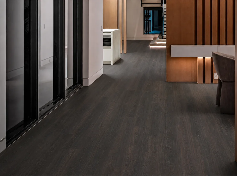 Mocha - 7/16&Quot; (11Mm) - Swiss Design Cork Floating (Fmoc11) Mocha 11Mm Dark Wood-Look Cork Flooring Installed In A Contemporary Hallway.