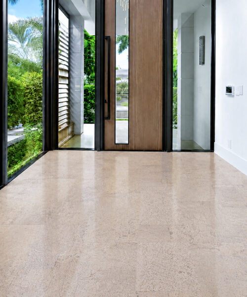 Mystic Vanilla Swiss Real Cork Floating Flooring With Subtle Natural Texture In A Bright, Glass-Walled Modern Entryway.