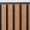 Natural cork slat acoustic wall panel dark backing.