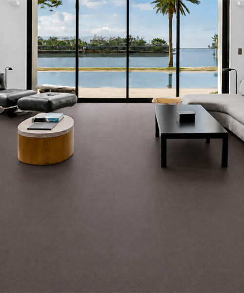 Night - 7/16&Quot; (11Mm) - Swiss Real Cork Floating (Fnig11) Night Cork Flooring For A Living Room Surrounds Curved Sofas And Black Tables Overlooking The Waterfront.