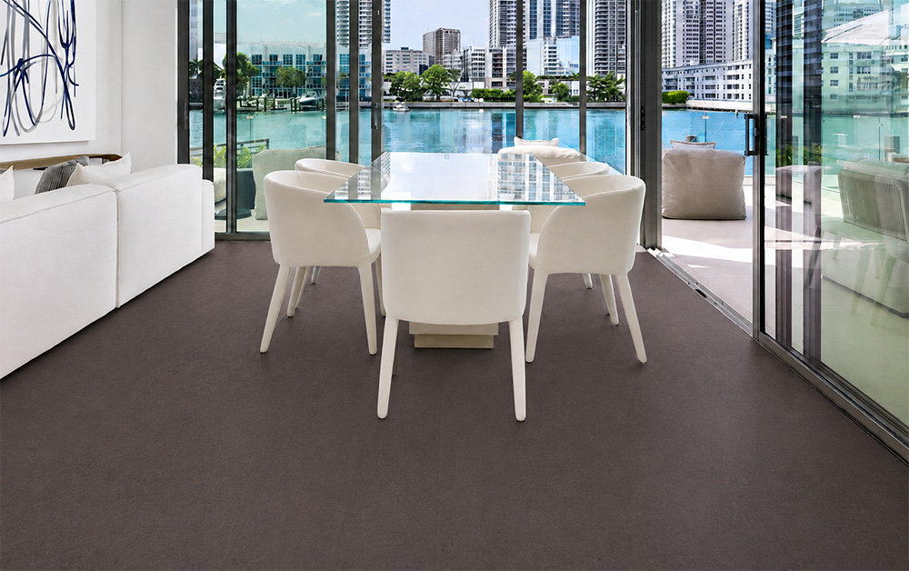 Night - 7/16&Quot; (11Mm) - Swiss Real Cork Floating (Fnig11) Night Natural Cork Flooring Runs Beneath White Dining Chairs Beside Glass Doors With City Waterfront Views.