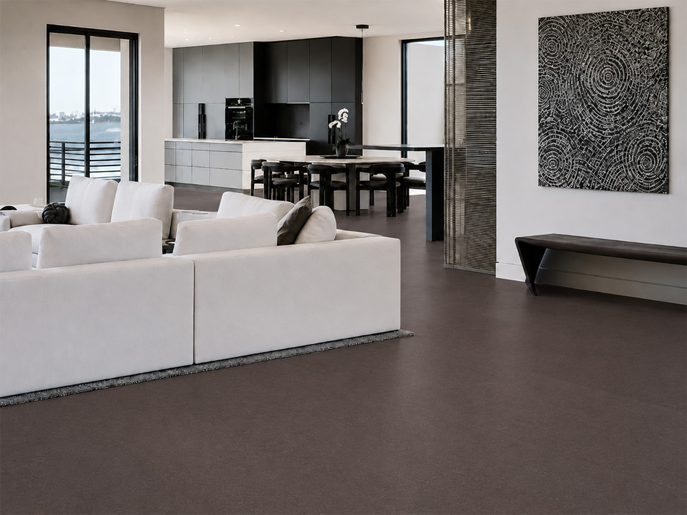 Night - 7/16&Quot; (11Mm) - Swiss Real Cork Floating (Fnig11) Night Cork Flooring For A Living Room Surrounds Curved Sofas And Black Tables Overlooking The Waterfront.