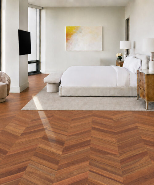 Noble Chevron Wood-Look Cork Flooring Anchors A Bright Bedroom With Lounge Chairs And City-Facing Windows.