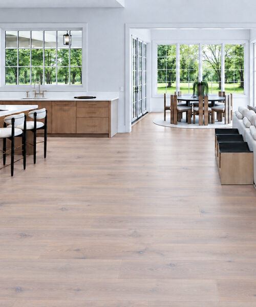 Nordic Oak - 3/8&Quot; (9.5Mm) - Forna Natural Composite Flooring With Waterproof Hydrowood Core (Nnoro9.5) Nordic Oak Light Gray Wood-Look Natural Composite Flooring Connects An Open Kitchen, Dining Area, And Living Room.