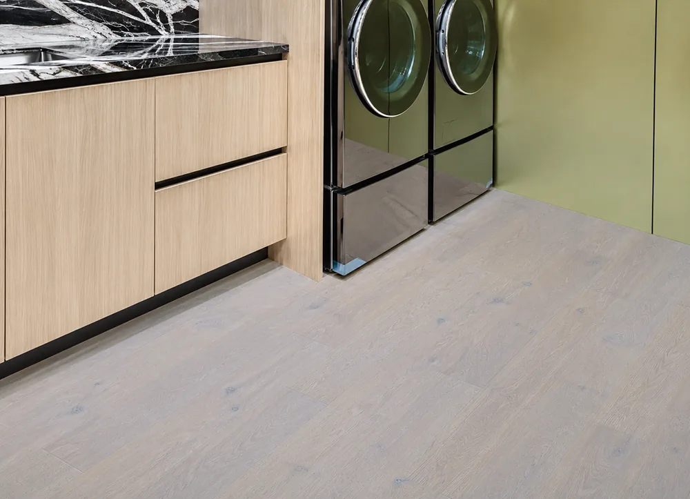 Nordic Oak - 3/8&Quot; (9.5Mm) - Forna Natural Composite Flooring With Waterproof Hydrowood Core (Nnoro9.5) Nordic Oak Natural Composite Flooring In A Modern Laundry Room With Wood Cabinets And Front Load Washers