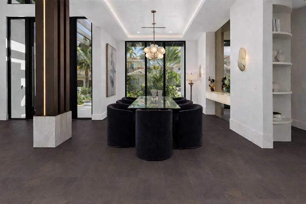 Onyx - 7/16&Quot; (11Mm) - Swiss Real Cork Floating (Fox11) Luxury Dining Room Interior Featuring Onxy Swiss Cork Flooring, Modern Furniture And Large Glass Doors.