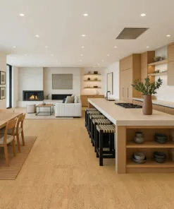 Bright dining and kitchen area with Rhythm Swiss cork flooring, blending natural textures with Scandinavian wood cabinetry.