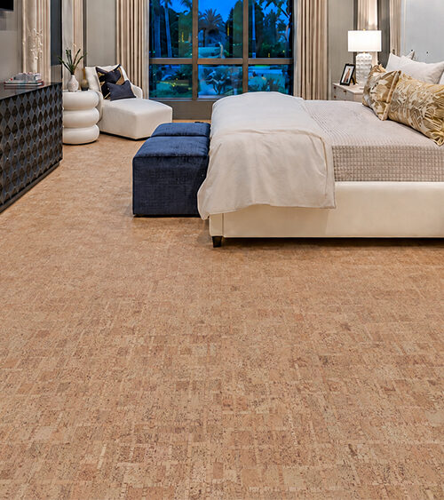Natural Parcork Cork Floor Planks In A Staggered Layout Across A Contemporary Primary Bedroom.