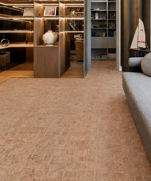 Warm Brown Parcork Natural Cork Flooring Complements A Contemporary Living Room With Built-In Shelving.