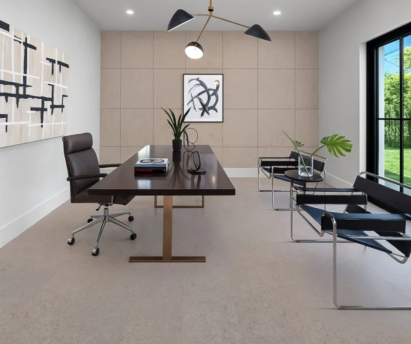 Office Flooring Options - Cork Flooring Modern Minimalist Home Office Featuring Porto Mist Swiss Natural Cork Flooring. The Room Includes A Dark Wood Desk With A Brass Base, A Brown Leather Office Chair, Two Black Leather Guest Chairs With Chrome Frames, And A Geometric Light Fixture Overhead. A Large Window Brings In Natural Light, Highlighting The Soft Beige Tones Of The Cork Floor And Matching Cork Wall Panels For A Cohesive, Contemporary Look.