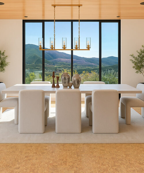 Elegant Dining Room With Panoramic Mountain View Featuring Warm Quodro Swiss Cork Flooring And Minimalist White Furniture.