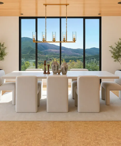 Elegant Dining Room With Panoramic Mountain View Featuring Warm Quodro Swiss Cork Flooring And Minimalist White Furniture.