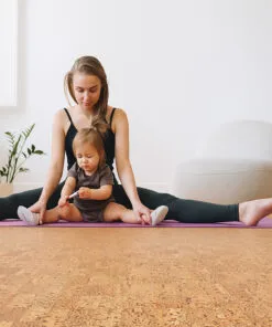 Quadro-B - 7/16” (11Mm) - Swiss Real Cork Floating (Fquab11) Mother And Child Stretching On Yoga Mat In Bright Room With Natural Quodro Swiss Cork Flooring. Pinterest Title: Family Yoga On Swiss Cork Floors