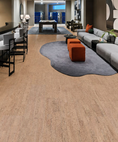 Rhythm – 7/16″ (11Mm) – Swiss Real Cork Floating (Frhy11) Rhythm Floating Cork Flooring Extends Through A Contemporary Bar Lounge With Curved Seating And Orange Ottomans.