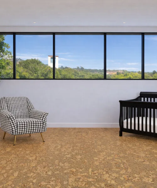 rococo cork flooring Nursery room featuring chevron cork flooring that is warm, cushioned, and safe for infants and toddlers.