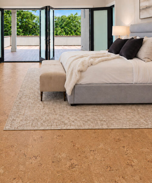 Salami - 1/4&Quot; (6Mm) - Cork Wall Tile Glue Down (Gsal6) Salami Golden Natural Cork Flooring Surrounds An Upholstered Bed Beside Open Patio Doors.