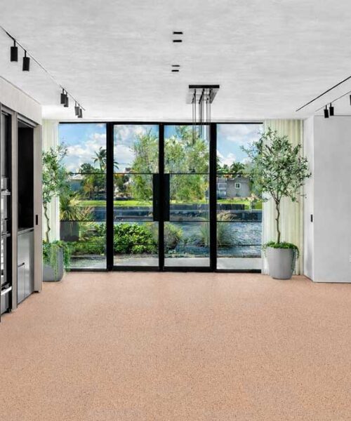 Seaside - 7/16&Quot; (11Mm) - Swiss Real Cork Floating (Fsea11) Contemporary Kitchen And Living Space With Seaside Cork Flooring, Large Glass Doors, And Natural Light.