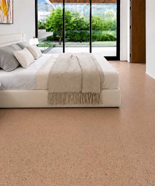 Warm Seaside Floating Cork Flooring Creates A Comfortable Foundation In A Bright Modern Bedroom.