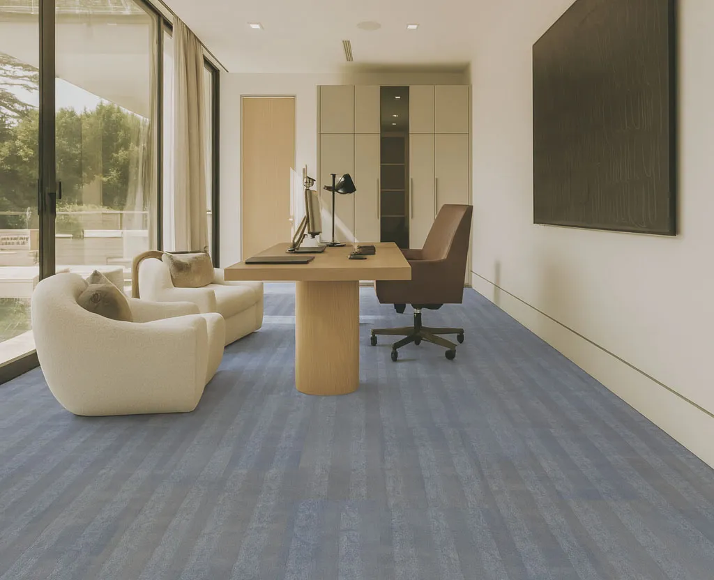 Home Office With Serpent Luxe Forna Swiss Luxury Leather Floating Flooring, Soft Blue-Gray Tones Adding Durability And Elegance Under A Desk And Lounge Chairs.