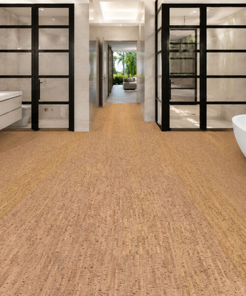 Silver Birch cork flooring in a spacious modern bathroom with a freestanding bathtub and spa-inspired design.