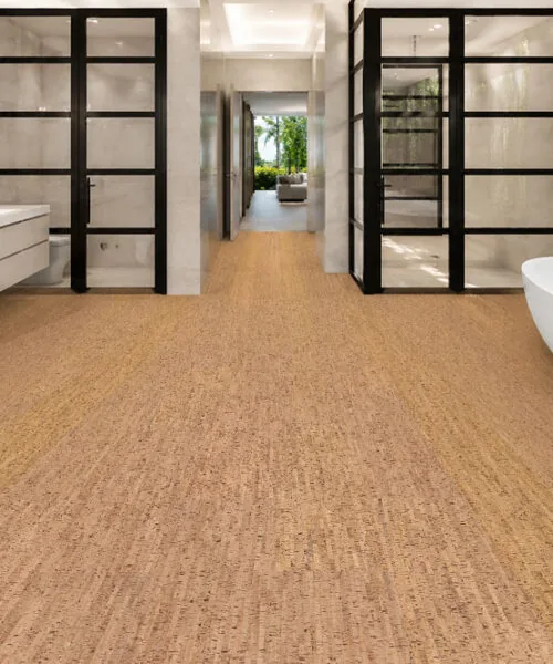 Silver Birch cork flooring in a spacious modern bathroom with a freestanding bathtub and spa-inspired design.