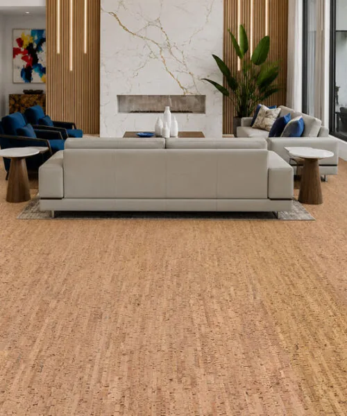 Silver Birch Cork Flooring In A Contemporary Living Room With Floor-To-Ceiling Windows Overlooking The Pool.