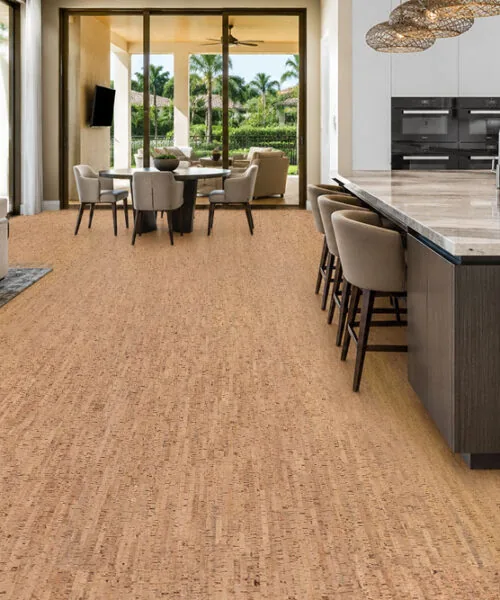 Silver Birch Natural Cork Flooring In A Modern Open-Concept Kitchen And Living Room With A Large Island