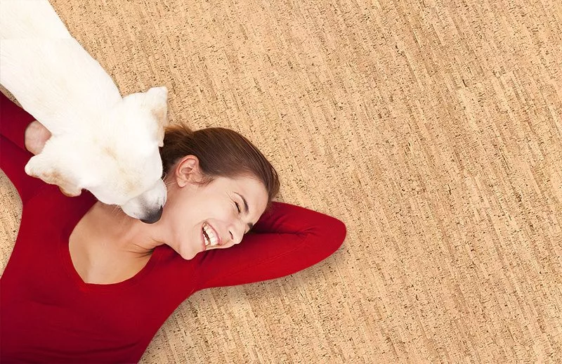 Is Cork Flooring Durable With Dogs Silver Birch Woman Lying On The Warm Cork Floor And Her Dog Licking Her Face Waterproof Flooring For Pets