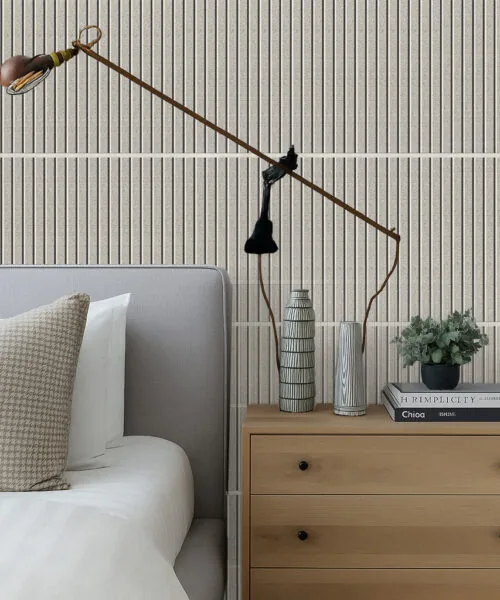 edroom with Slatwall Perla cork wall panels behind the bed, creating a textured accent wall with acoustic comfort.