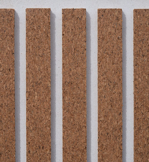 Natural cork slat acoustic wall panel with white backing for sound absorption, echo reduction, home theaters, offices, podcast studios, and modern interior design.