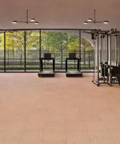 Solara solid massive glue down cork tiles installed in a modern fitness studio, offering cushioned comfort, sound absorption, and durable natural cork flooring.