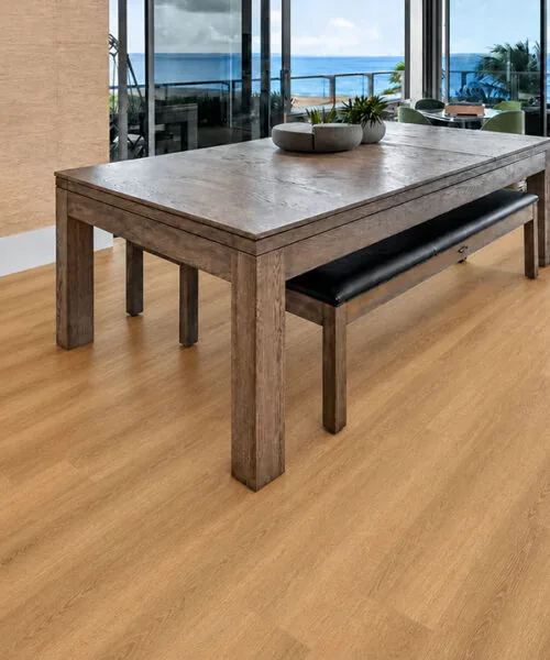Spanish Cedar - 13/32&Quot; (10.5Mm) - Design Cork Floating (Fsc10.5) Spanish Cedar Golden-Brown Cork Floating Flooring With A Natural Wood-Grain Pattern In An Ocean-View Dining Room.