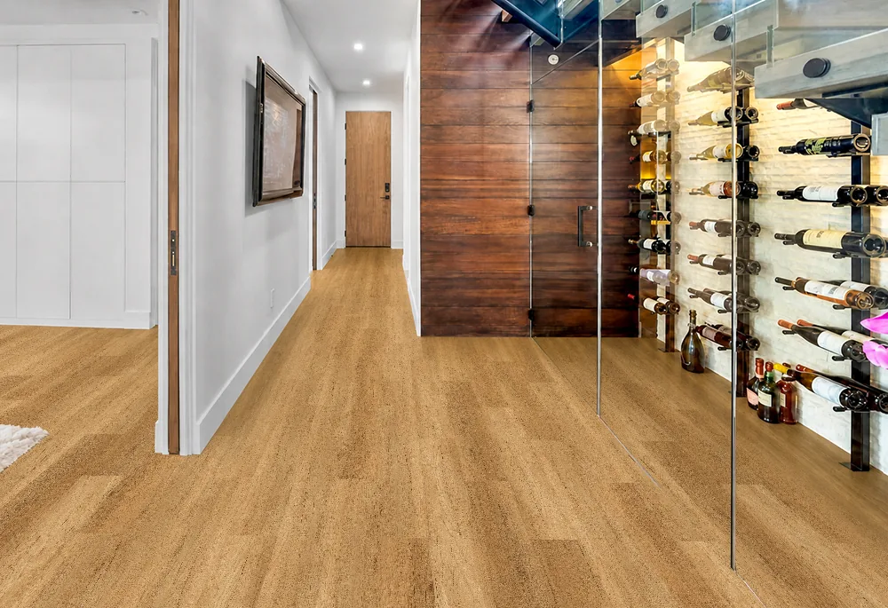 Spanish Cedar - 13/32&Quot; (10.5Mm) - Design Cork Floating (Fsc10.5) Spanish Cedar Natural-Brown Floating Cork Flooring In A Hallway Beside A Glass-Enclosed Wine Cellar.